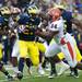 Michigan running back Fitzgerald Toussaint runs the ball in the game against Illinois on Saturday. Daniel Brenner I AnnArbor.com